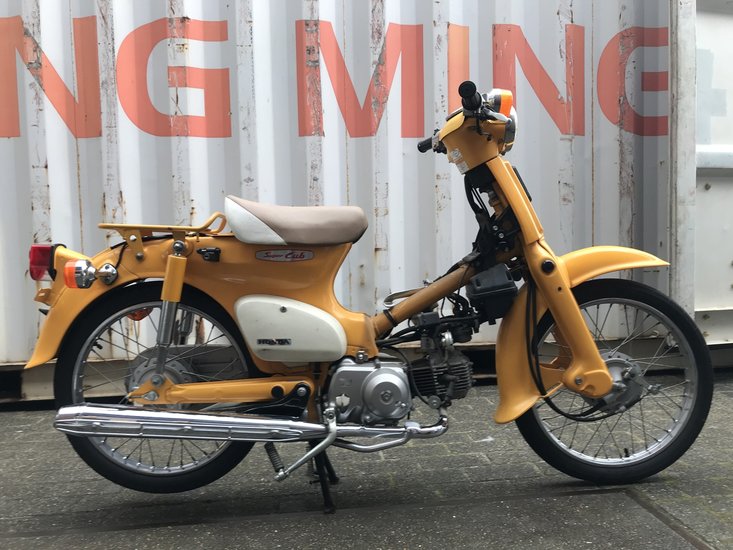 VERKOCHT! Honda C50 NT Japans, geel, 15275 km